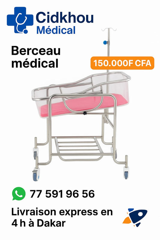 Berceau médical néonatal en acier inoxydable avec matelas rose, roulettes et support perfusion – Cidkhou Médical, livraison express à Dakar.